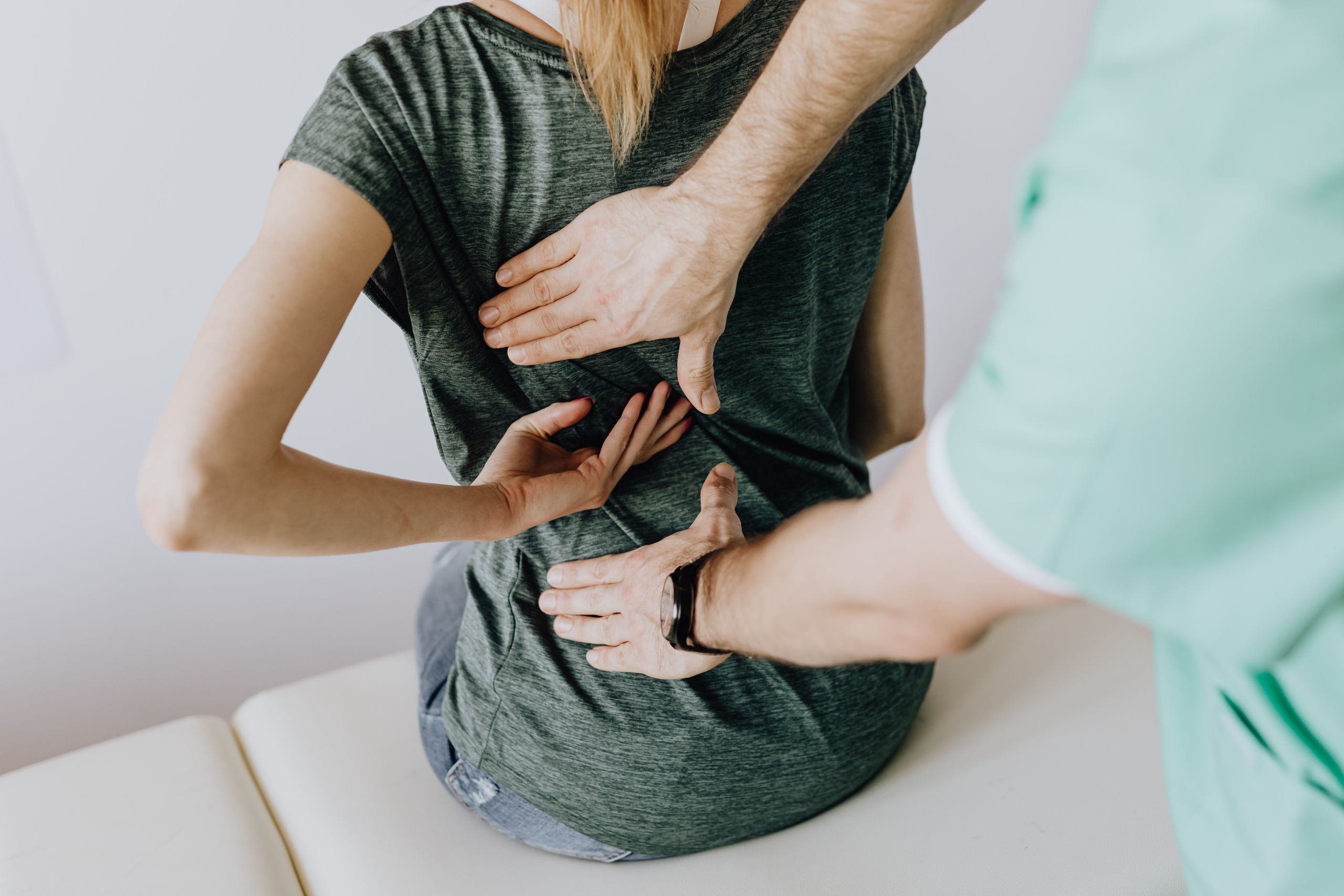Doctor examining a patient during a schedule loss of use evaluation